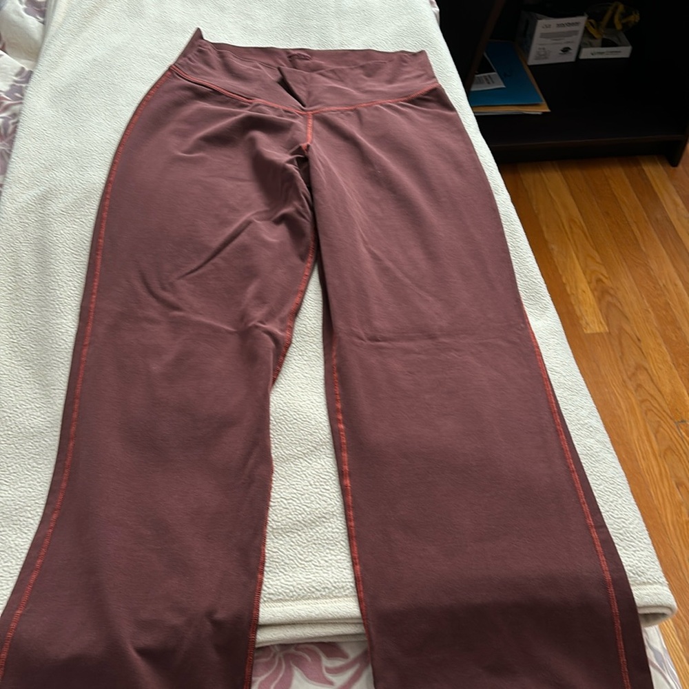 Brown cotton/spandex Patagonia pants. Great for being active. Comfy, stretchy.